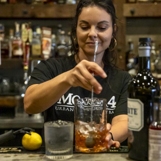 mojo no 4 bartender stirring a cocktail avondale fl