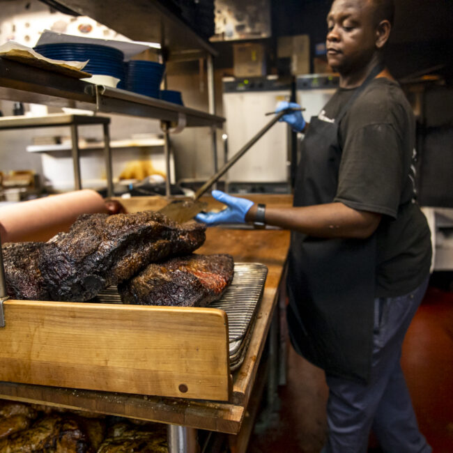 mojo bbq cook preparing freshly smoked brisket jacksonville fl