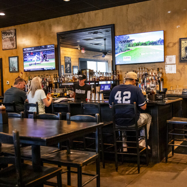 mojo smokehouse bartender serving guests fleming island fl