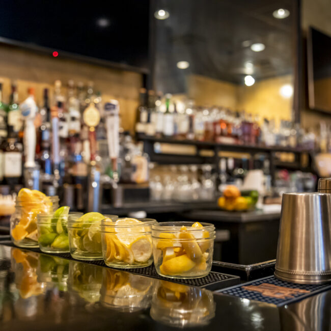 Mojo smokehouse bar sliced lemons, limes, and oranges on the bar top fleming island fl